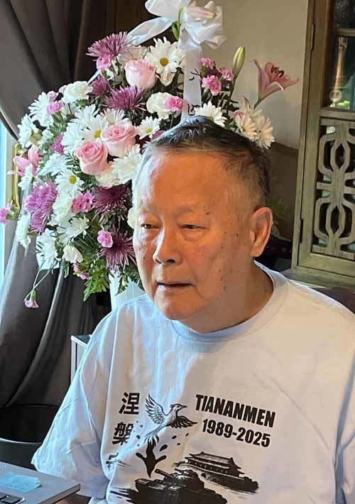 魏京生