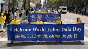 7月19日华埠见纽约法轮功反迫害27周年大游行(图)