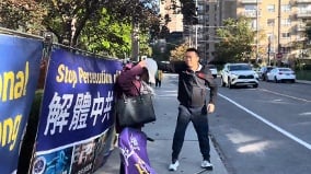 多伦多中领馆前法轮功真相点遭毁凶嫌:我枪毙你(图)
