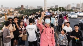 五一假期难掩经济寒意贸易战冲击下民怨不断(图)