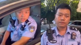 “我逆行怎么地”青岛再现穿警服的“路虎女”(图)