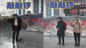 敲鑼抗議羅帥宇家人在長沙法院門前討公道(圖)