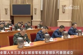 两会军费预算竟超GDP陆军司令李桥铭突现身(图)