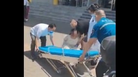被配型或被精神病河南街頭醫院人員手銬抓人(圖)