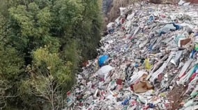 中国“永久基本农田”沦为垃圾场污染水源危及健康(图)