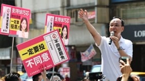 死亡連署風波加劇藍營台中市黨部多處遭搜索(組圖)