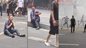 慘烈：重慶男子捅路人2傷當街割喉欲自殺(組圖)