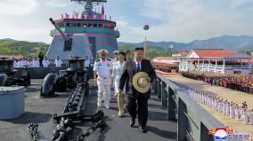恐怖下场金正恩出席沉船驱逐舰下水典礼这官员不见了(组图)