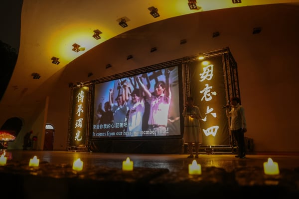在台港人在台北228和平公園舉行燭光晚會。（以上圖片來源皆為中央社）