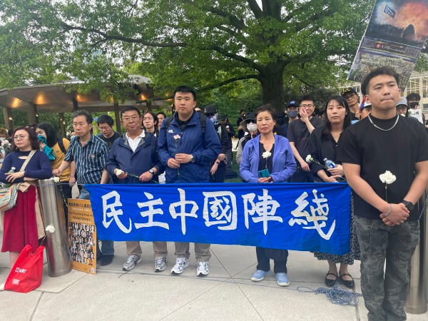 民陣