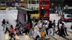 移英港人深感迷茫留守港人则指“香港已死”(图)