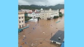 北京暴雨山洪路斷橋毀密雲水庫洩洪一片汪洋(圖)