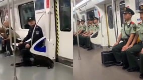 「有人揚言9.3要搞大事」北京地鐵一警一犬守門(圖)