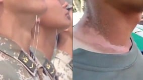 中共阅兵奴役式训练尖刺扎脖颈部晒掉皮(组图)
