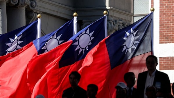 中共对台湾虎视眈眈，除进行文攻武吓，还持续对台进行渗透行动。（图片来源：I-HWA CHENG/AFP via Getty Images)