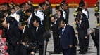 习携政治局常委在大风中献花篮东部战区陆军政委换人(图)