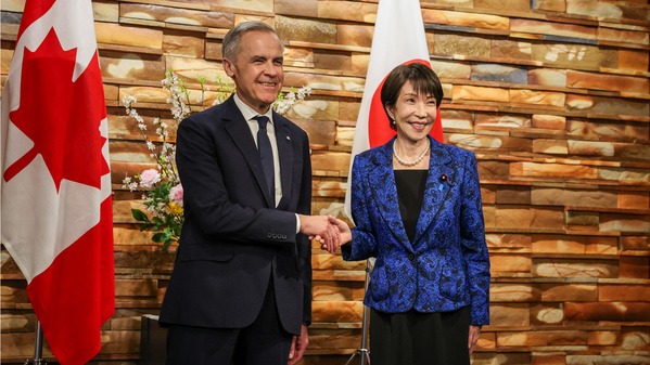2026年3月6日，加拿大总理卡尼（左）在日本东京与首相高市早苗会面。（Takashi Aoyama/POOL/AFP via Getty Images)