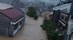 暴雨席卷中国多省洪灾已致22死20失踪图)(图)