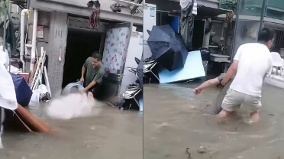 上海暴雨街道成河传因民宅进水2人触电身亡(图)