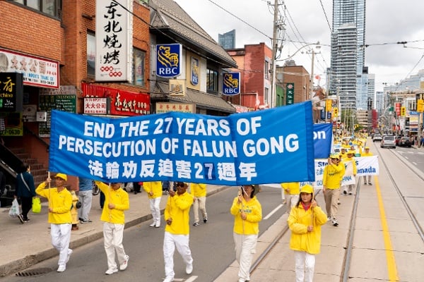 2026年9月20日，上千名加拿大法輪功學員在多倫多市中心舉行大型遊行，呼籲反迫害以及停止中共跨國鎮壓。（看中國特約攝影Evan）
